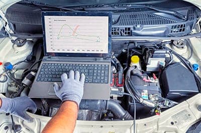 Mechanic carrying out a pre-purchase car inspection in Jacksonville, FL